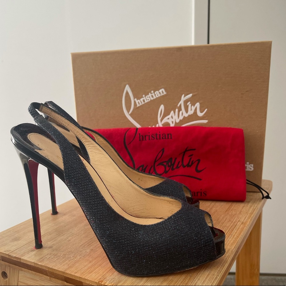 Louboutin heels. Size 37. Navy glitter heel